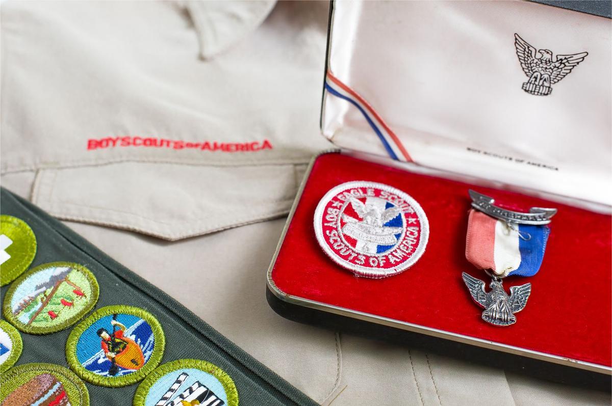 An Eagle Scout medal and patch in a presentation case